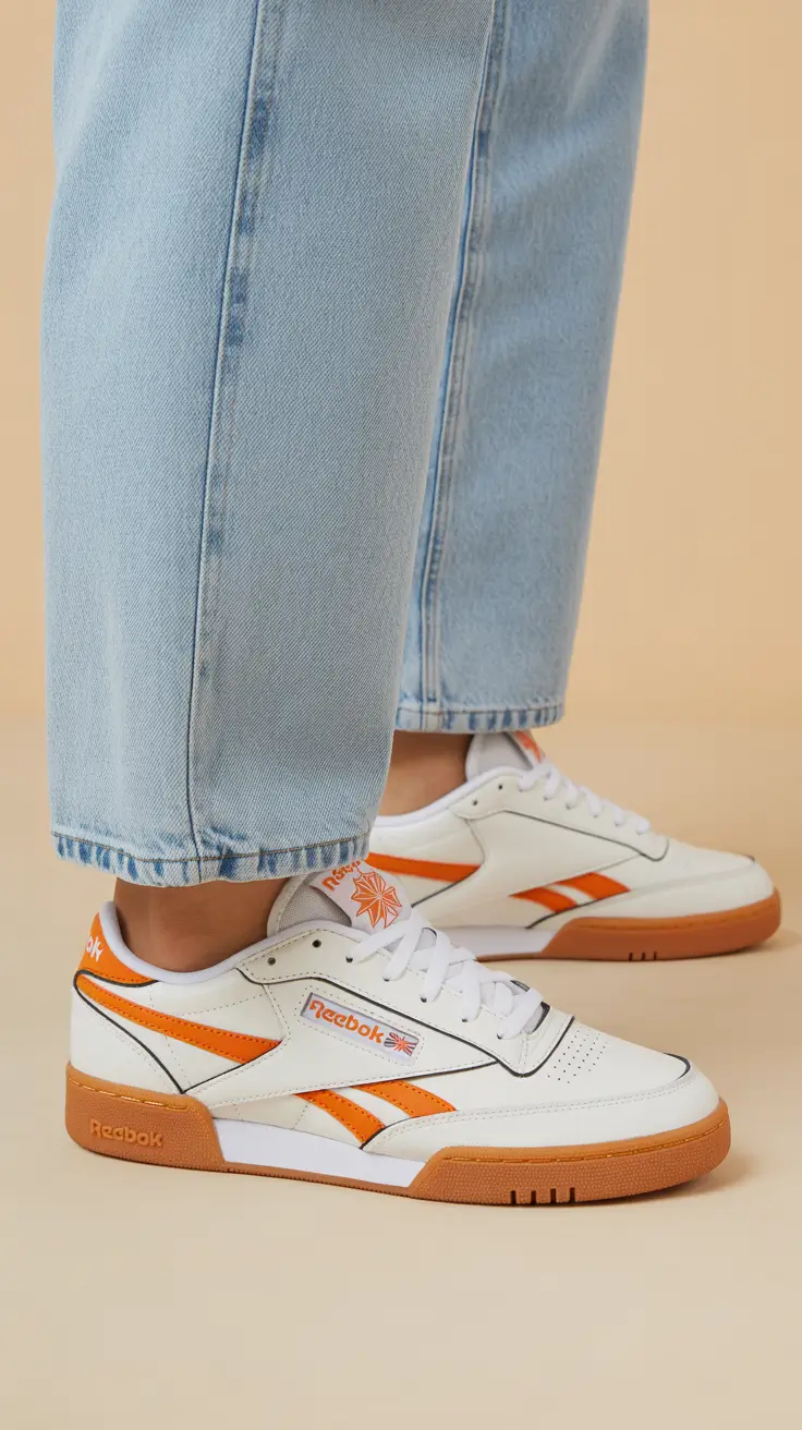 summer outfits with sneakers for women 2026 White and Orange Sneakers with Crisp Summer Denim