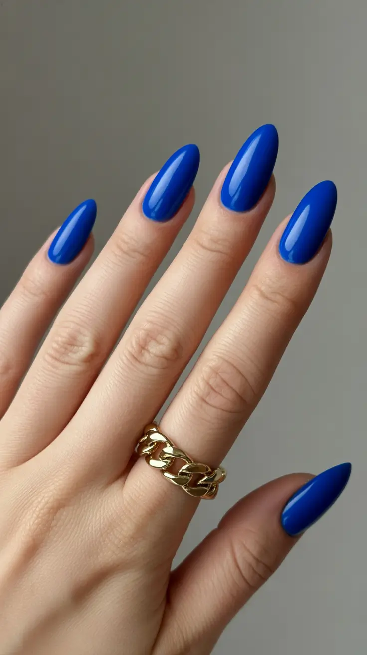 spring nail colors 2026 Pure Cobalt Shine in Almond Perfection