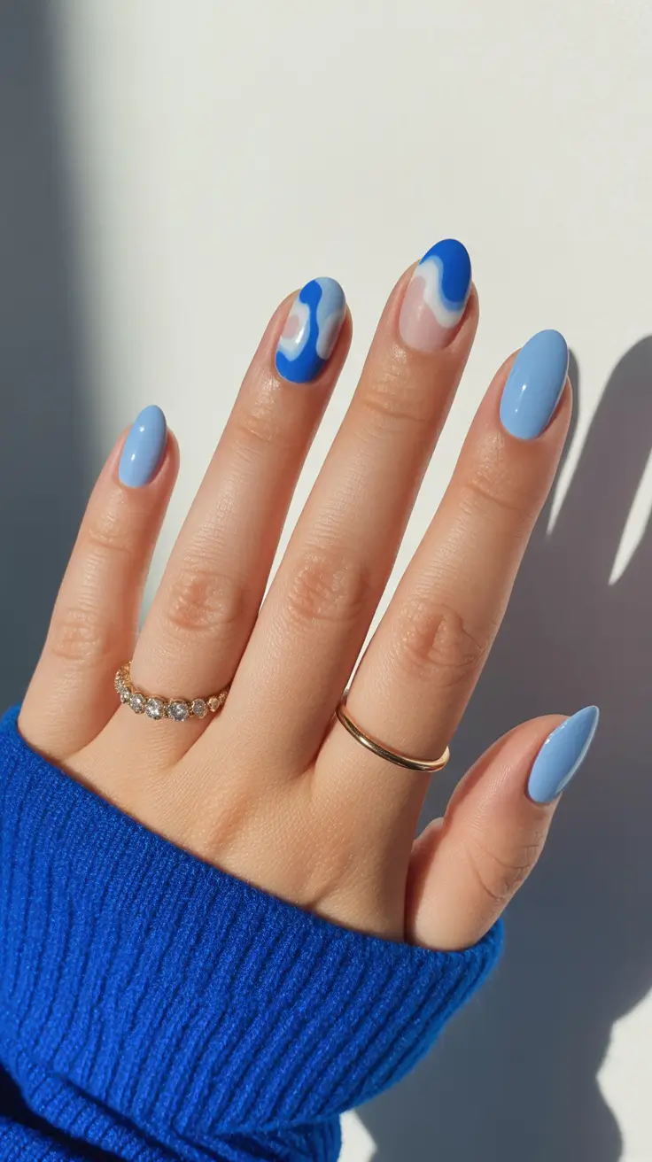 fun spring nails 2026 Blue ripple minimalism in almond spring tones