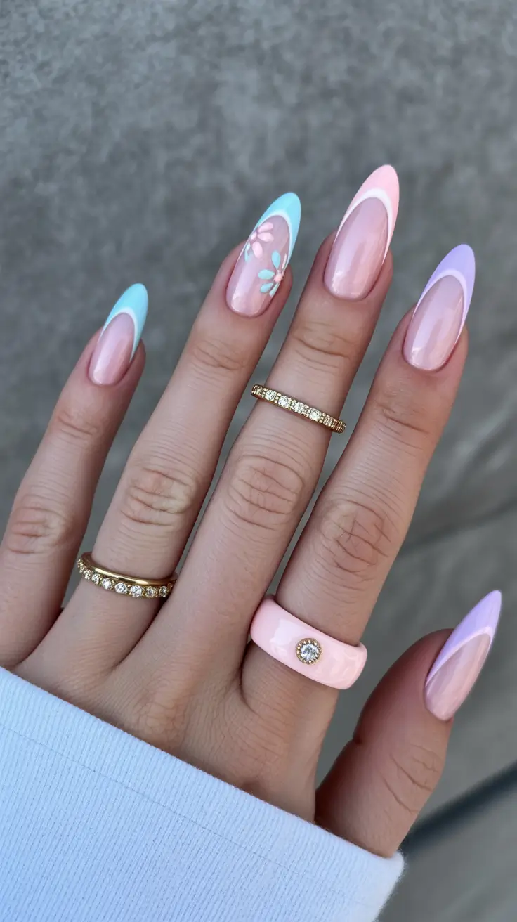 fun spring nails 2026 Pastel arc French in mixed spring tones