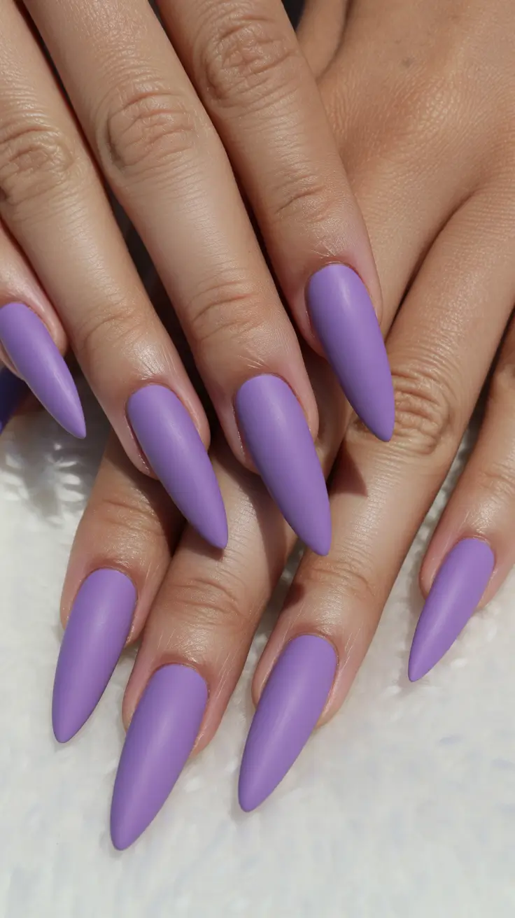 popular spring nail inspo 2026 Matte Lilac Stiletto Statement Nails for Bold Spring Energy