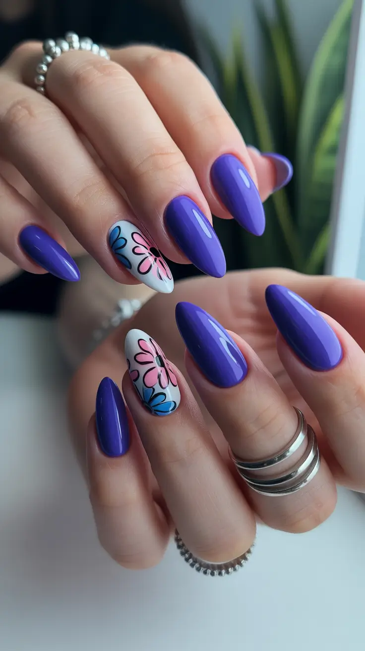popular spring nail inspo 2026 Glossy Violet Almond Nails with Graphic Daisy Accent