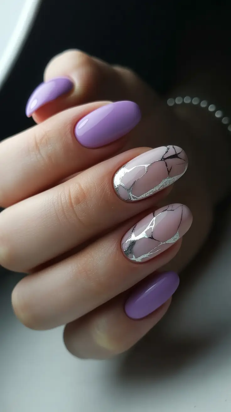 popular trendy spring nails 2026 Lavender Marble Vein Accent on Almond Nails