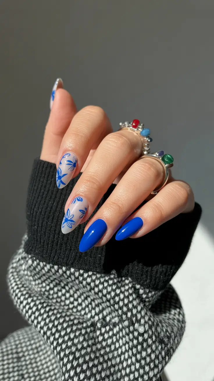 stunning spring break nails 2026 Cobalt Floral Contrast Almond