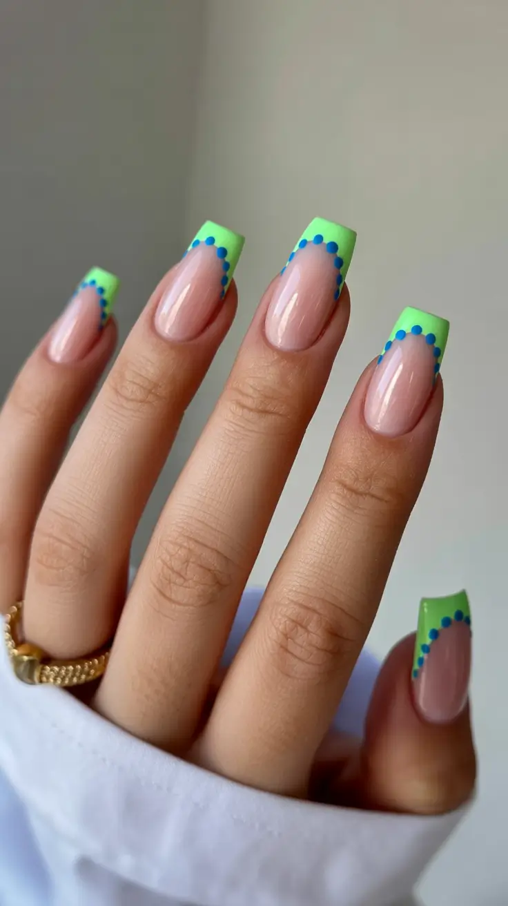 amazing spring nail art inspiration 2026 Playful Neon French With Graphic Dot Accents