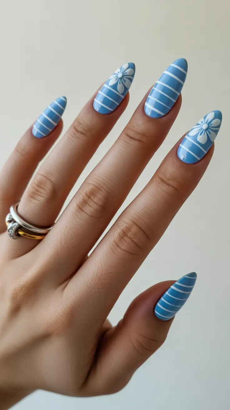 best classy spring nails 2026 Powder Blue Stripe Floral Almond
