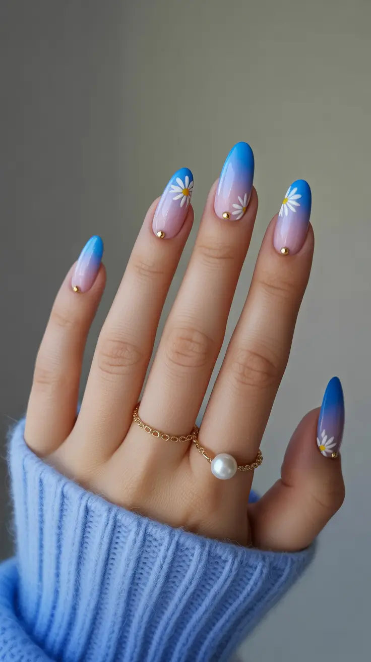 new early spring nails 2026 Soft Blue Ombre Daisy Nails for the First Warm Days