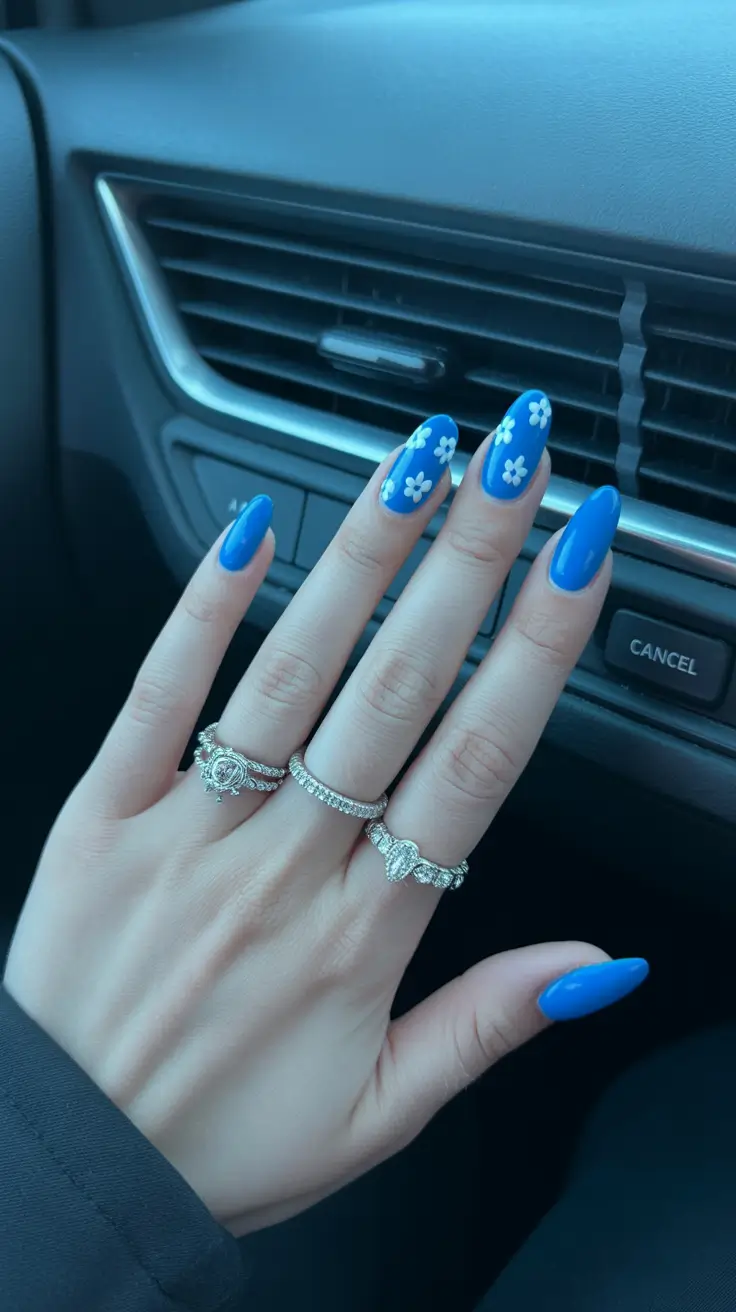 summer nail art ideas 2026 aesthetic Classic Cobalt Gloss With Daisy Accents