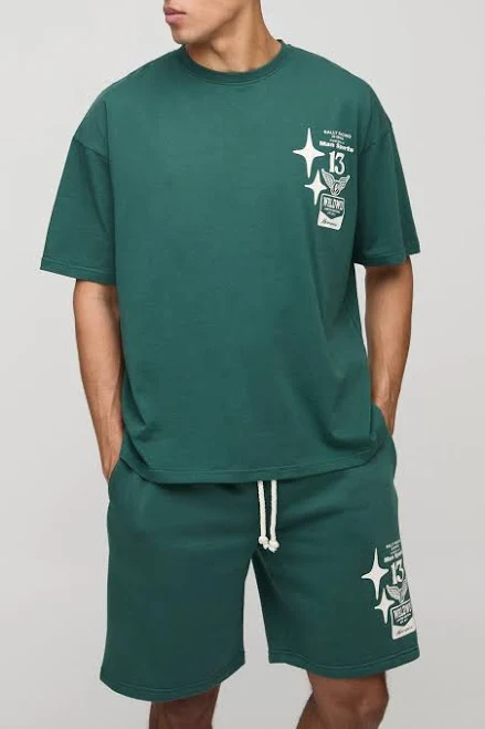 two piece set boohooMAN Men's Oversized Moto Graphic T-Shirt & Short Set boohoo USA $38