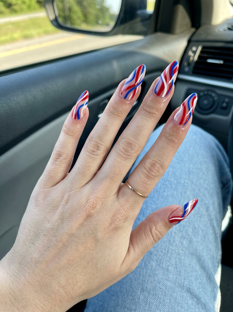 Kinetic Americana abstract lines nails for 4th of July nails 2026. Edgy festival, energetic look.