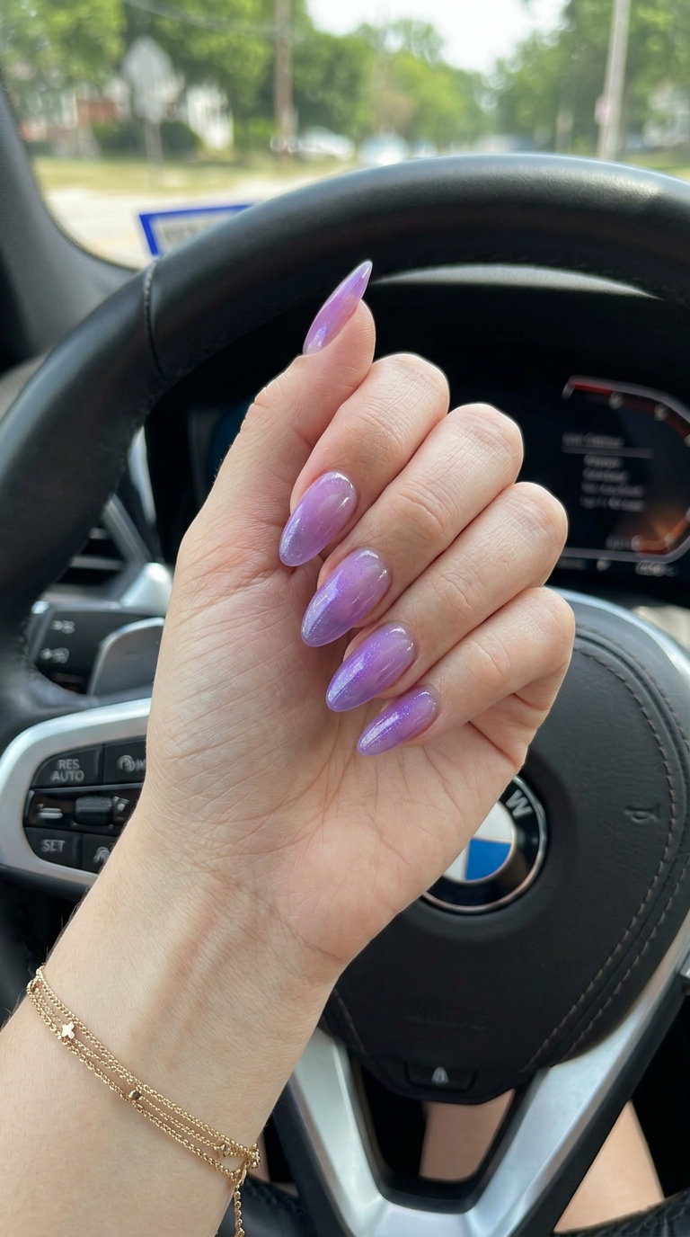 Pale lavender jelly ombre almond nails 2026 for fair skin. Romantic, dreamy summer evening manicure with subtle shimmer.