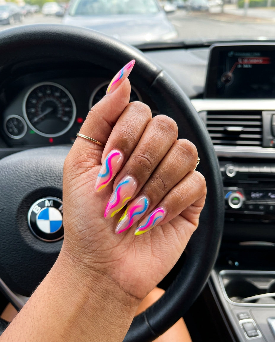 Cute Summer Nails 2026: Abstract Glass Art Cute summer nails 2026: Edgy stiletto nails with multicolor abstract glass art design.