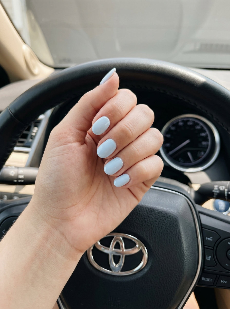 Pale Sky Blue Milky Finish Nails 2026 Pale Sky Blue Milky Finish: Oval summer nails 2026 for all skin tones. Opaque pale sky blue milky gel.