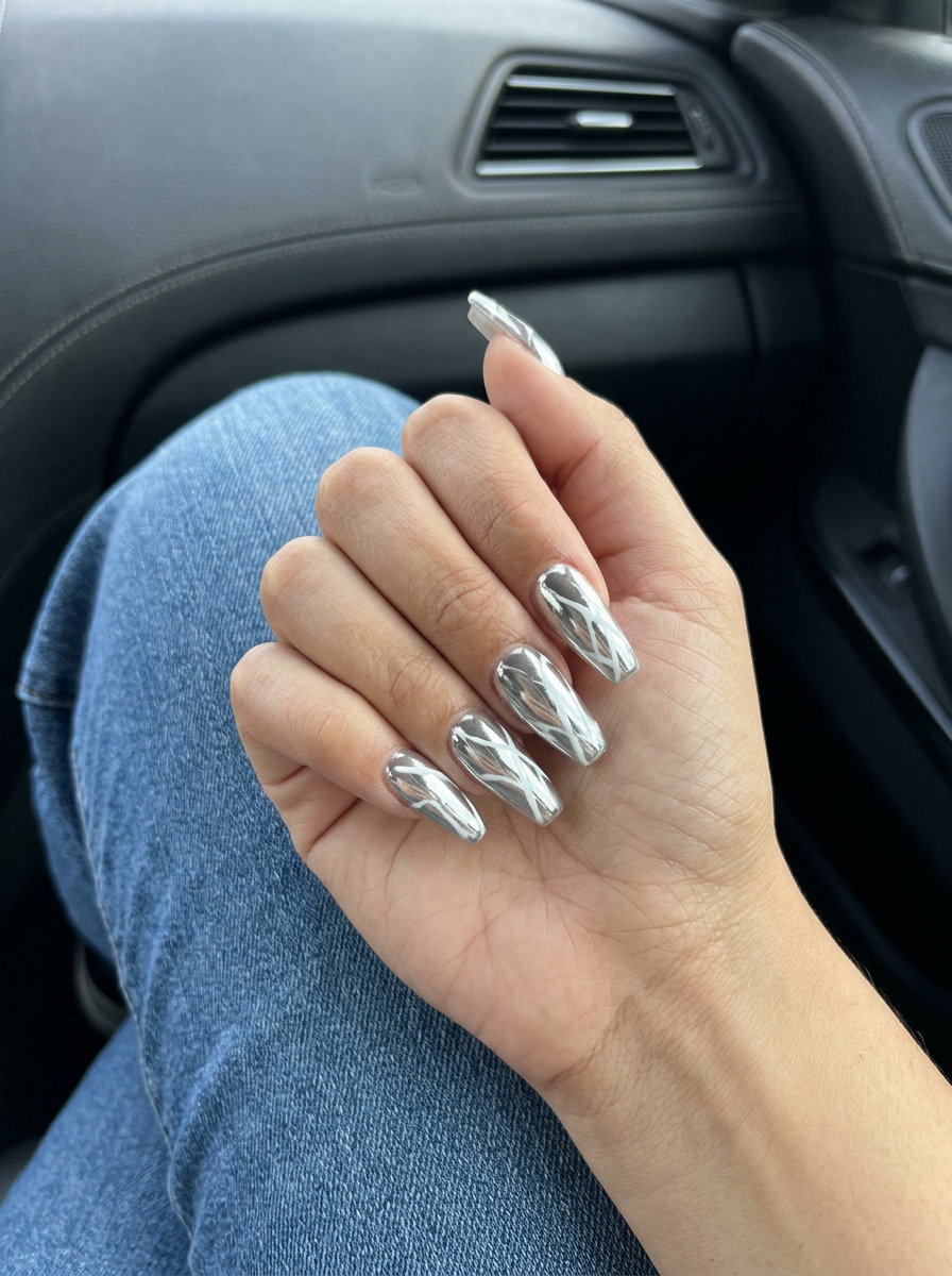 White chrome abstract lines on sheer nude for shell summer nails 2026. Modern & edgy style.
