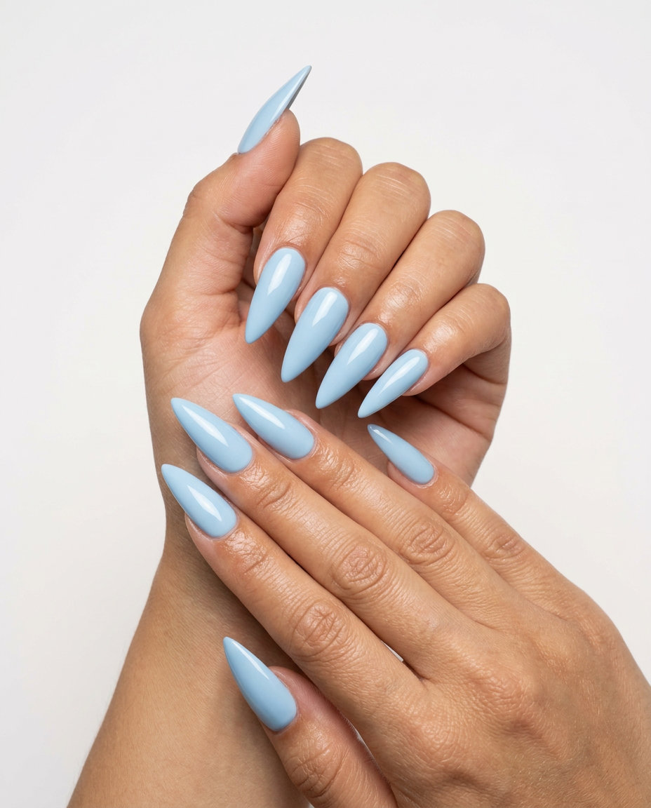 Sky blue stiletto nails for parties 2026. Glamorous and bold.