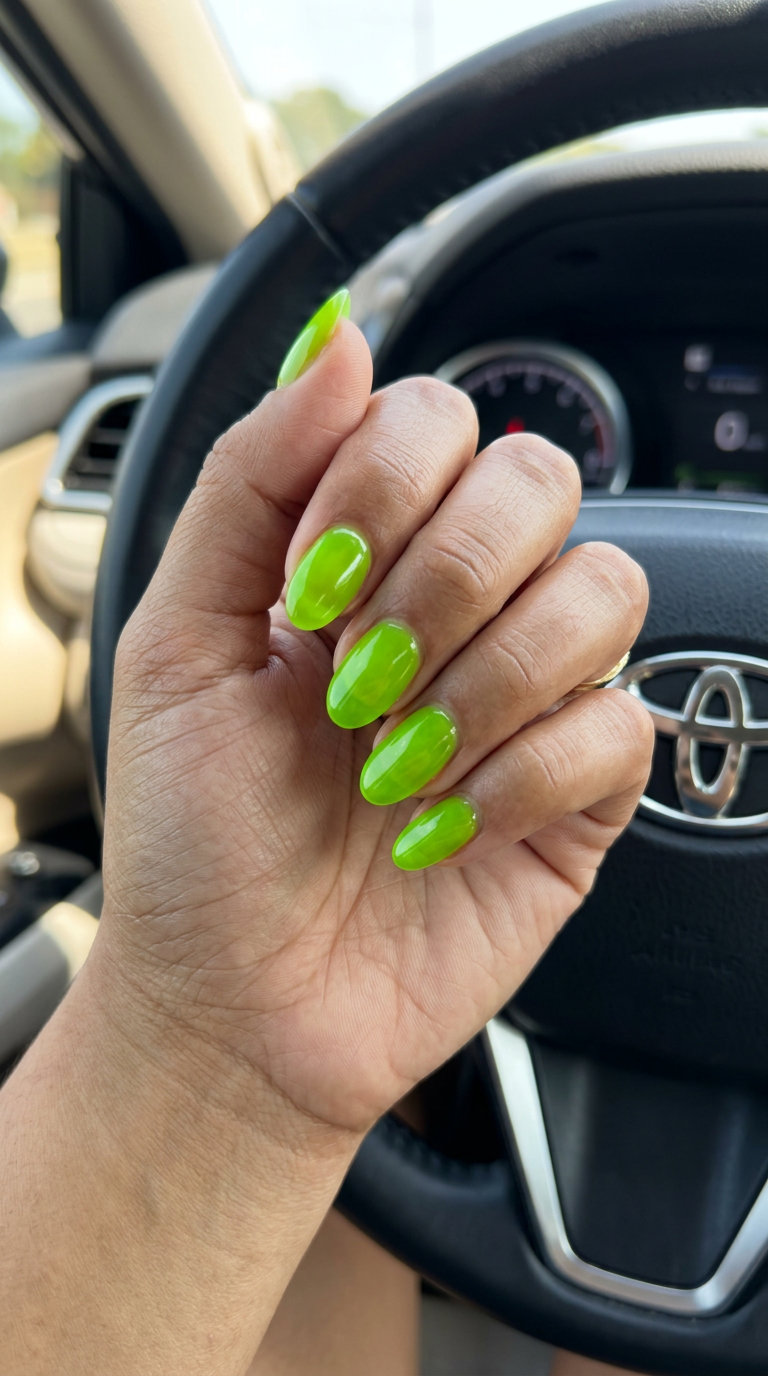 Vibrant Lime Jelly Oval nails: simple summer acrylic nail designs 2026. Playful, bold, perfect for festivals and summer parties.