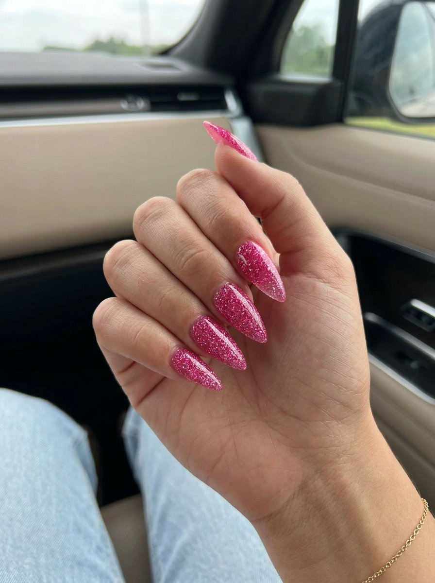 Fuchsia Fiesta Stiletto nails with glitter for festivals and summer parties 2026.
