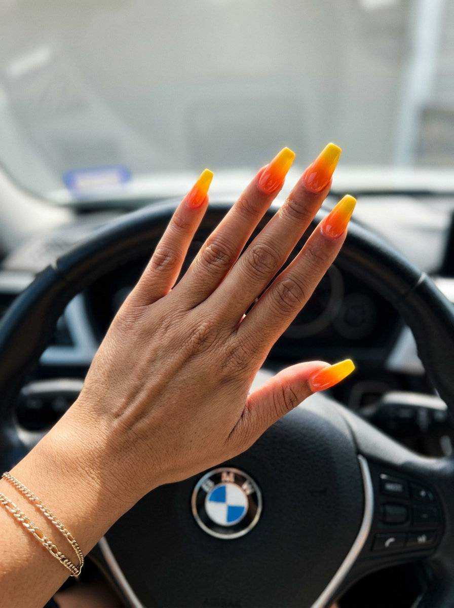 Citrus Zest Ombre Coffin nails: yellow to orange gradient for festivals and summer parties. Summer fruits nail art 2026.