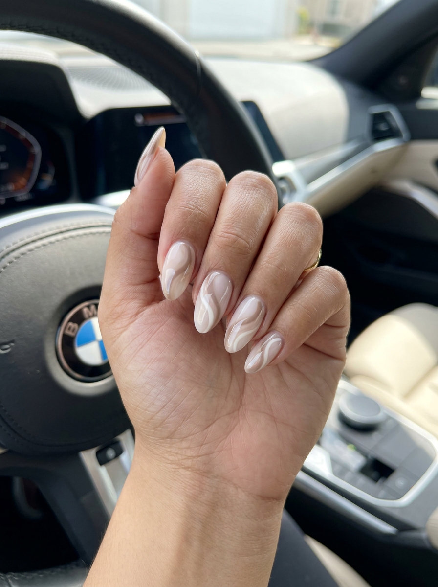 Abstract Swirls Nude Glossy nails for summer nails 2026: sophisticated daily work outfit.