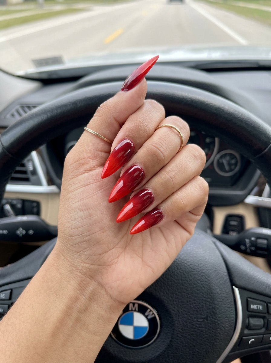 Crimson sunset ombre stiletto nails for summer 2026, perfect for date nights and evening events.