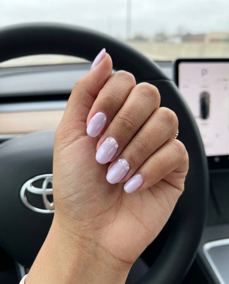 Lilac Dream Oval Pearl nails for summer wedding nails 2026. Whimsical light lavender with iridescent pearl accents.