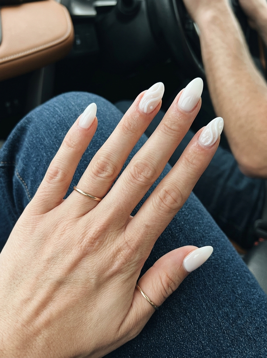 Milky white nails with 3D sculpted accents for summer wedding nails 2026. Chic & elegant.