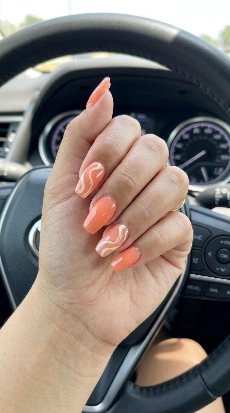Sunset swirl jelly coffin nails for summer wedding nails 2026. Bohemian vacation style.